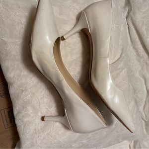 Pearl white pumps worn once.